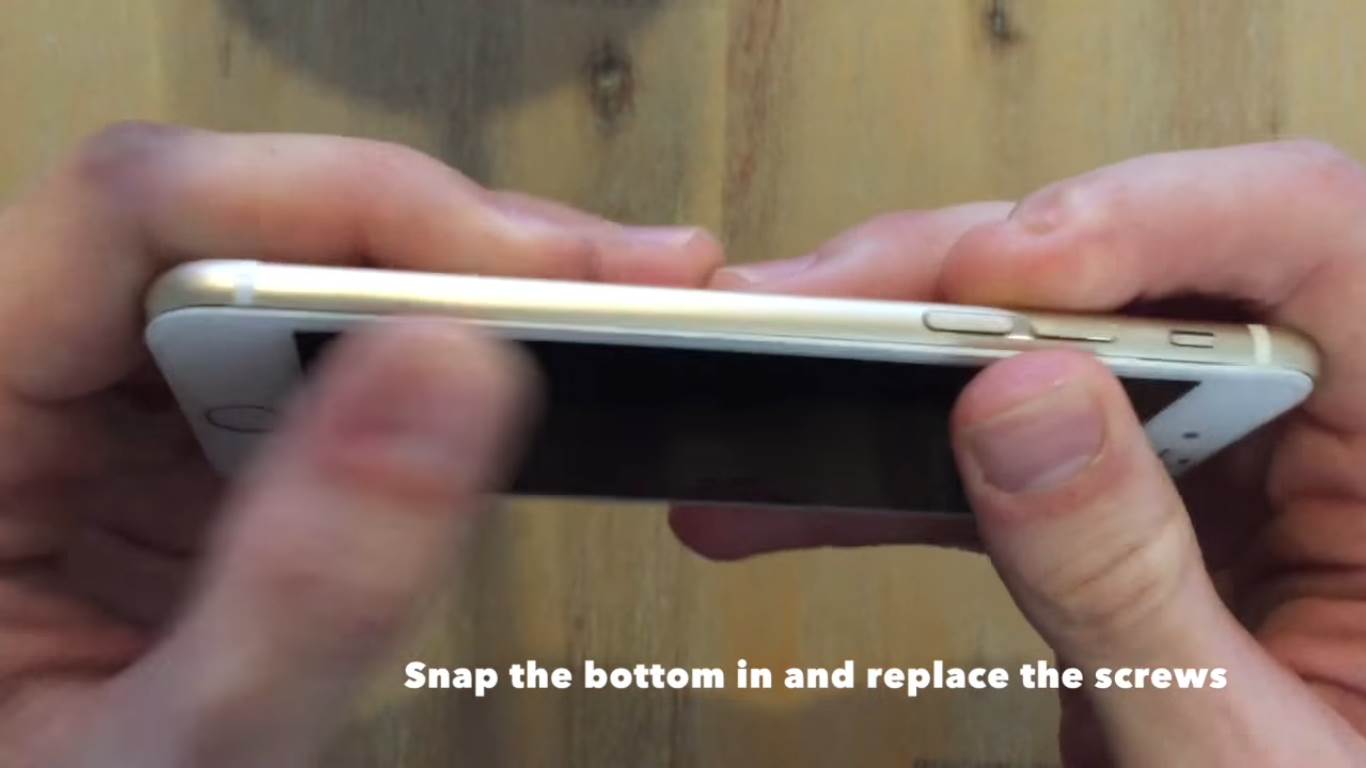 snap the bottom into place and replace the screws