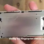 unclip the fingerprint ribbon connector