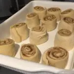 cinnabons in tray before baking