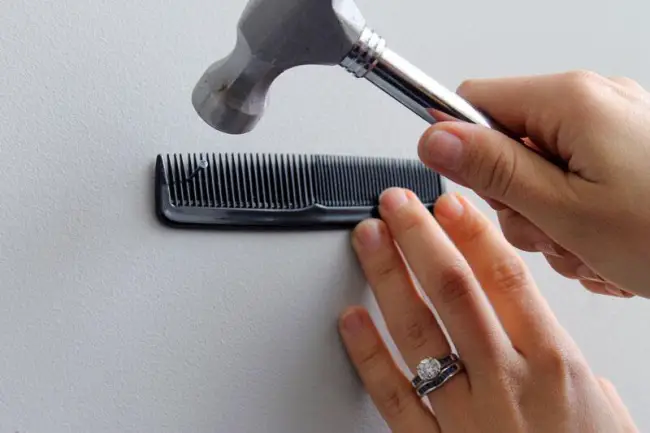use a hair comb to hold nails