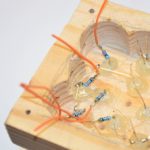 solder resistors the the leds