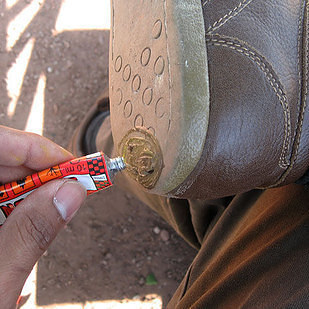 repair holes in your shoes with a puncture repair kit