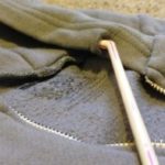 staple the hoodie cord to a straw