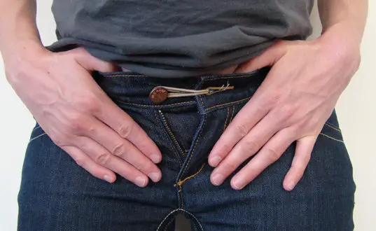 use a rubber band to expand your jeans