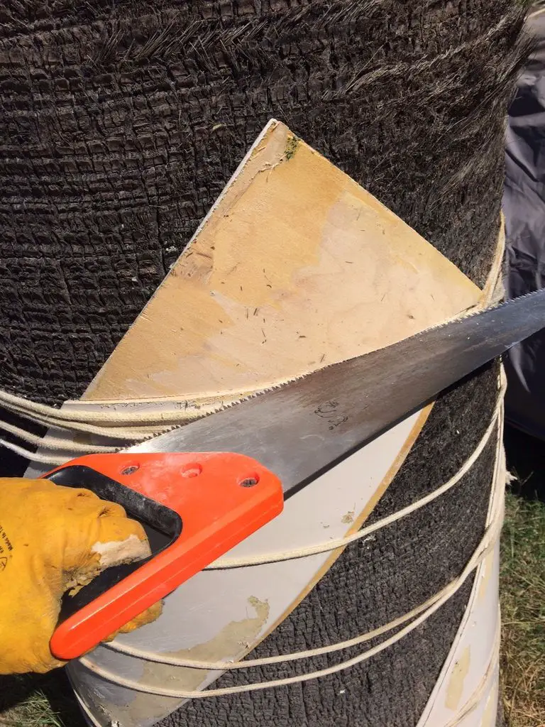 use a wood saw to cut the corners off of the blades