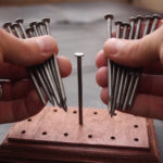 balancing nails puzzle