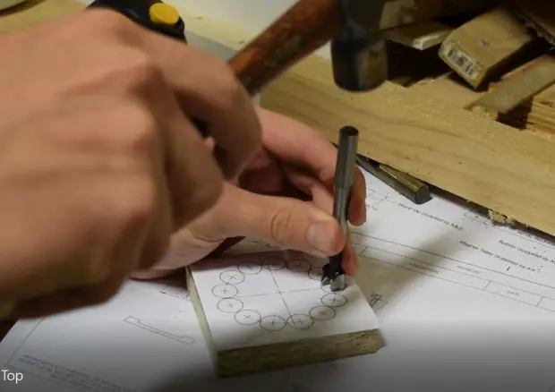 use a center punch to mark the circles