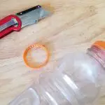 Cut The Ring Off Of The Neck Of The Bottle