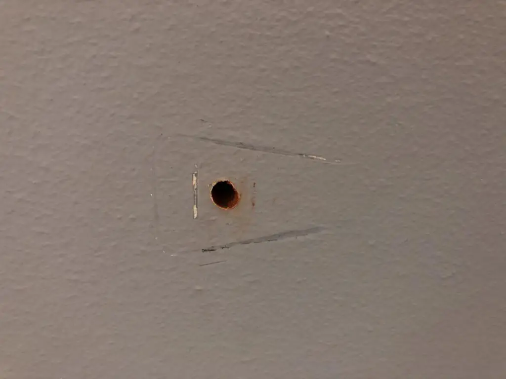 hole in masonry wall