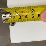 Mark off locations for new shelf hooks