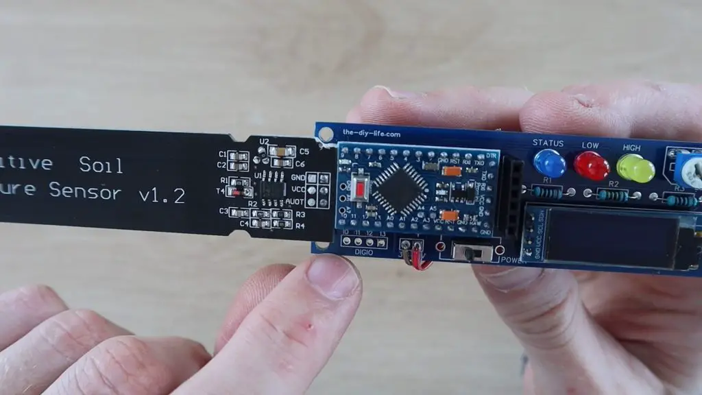 Connect the moisture sensor VCC pin to the Arduino IO pin 10