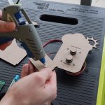 Use-A-Glue-Gun-To-Stick-Electronic-Components-To-MDF