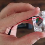 Remove Power Cables From Fan Retaining Clips