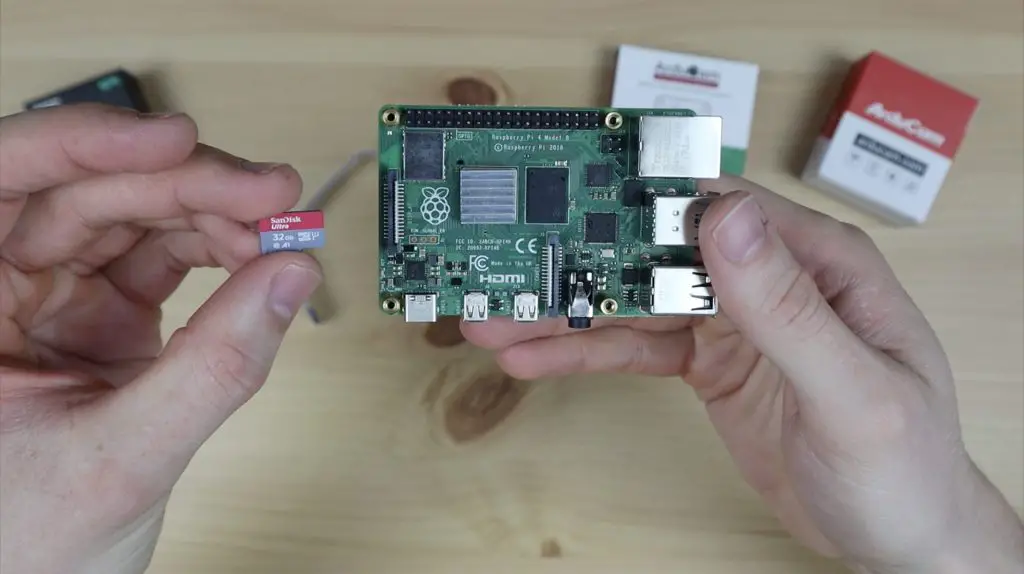 SanDisk MicroSD Card Plugging Into Raspberry Pi