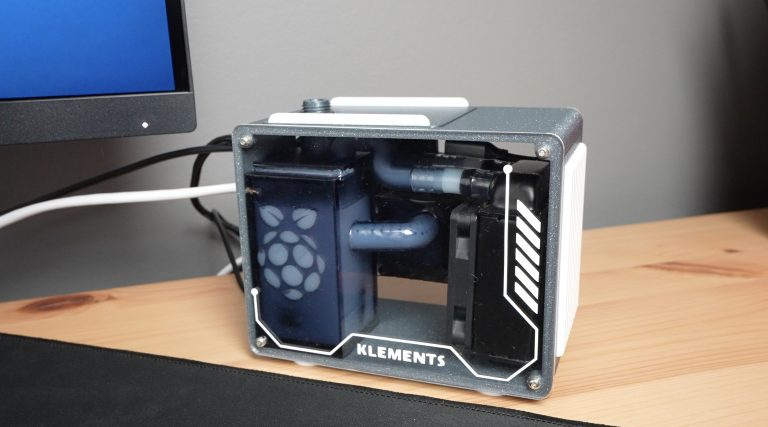 Raspberry Pi 5 Case With An Integrated Water-Cooling Loop